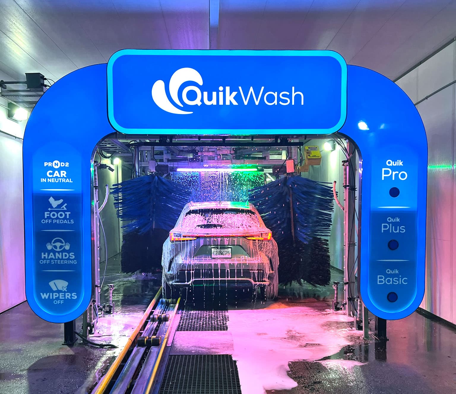 Car being washed at QuikWash